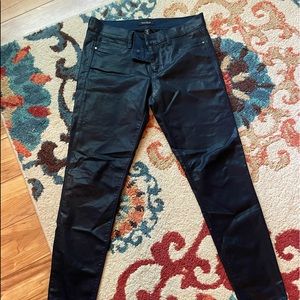 White House Black Market skinny leg coated jeans.